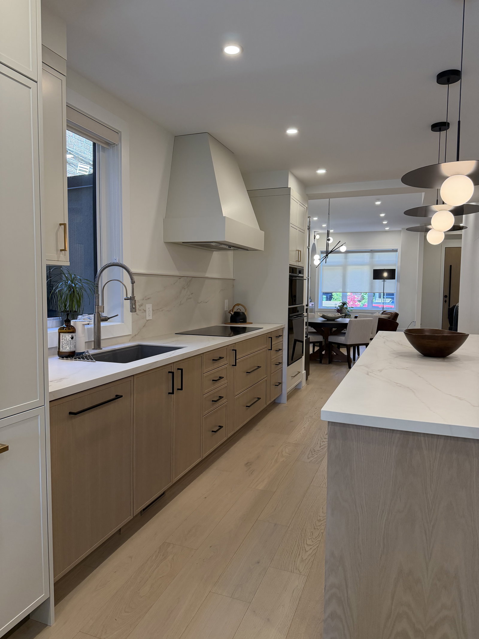 Modern kitchen with light wood.