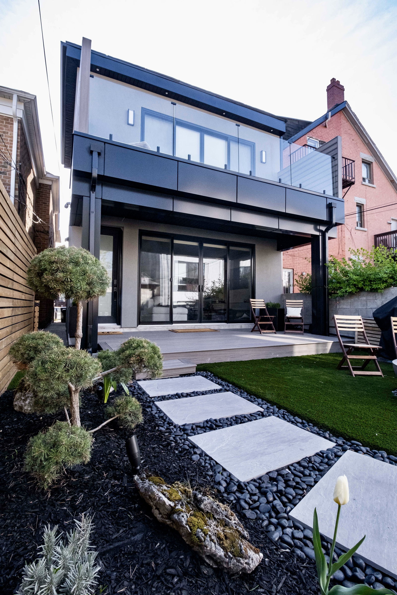 Completed luxury addition with integrated landscaping