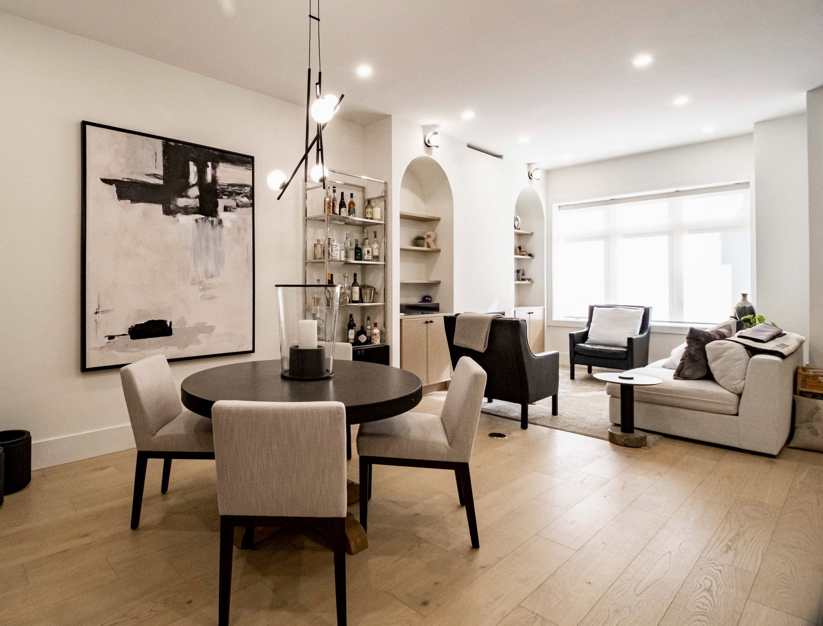 Spacious open concept living area in a custom Oakville rebuild.