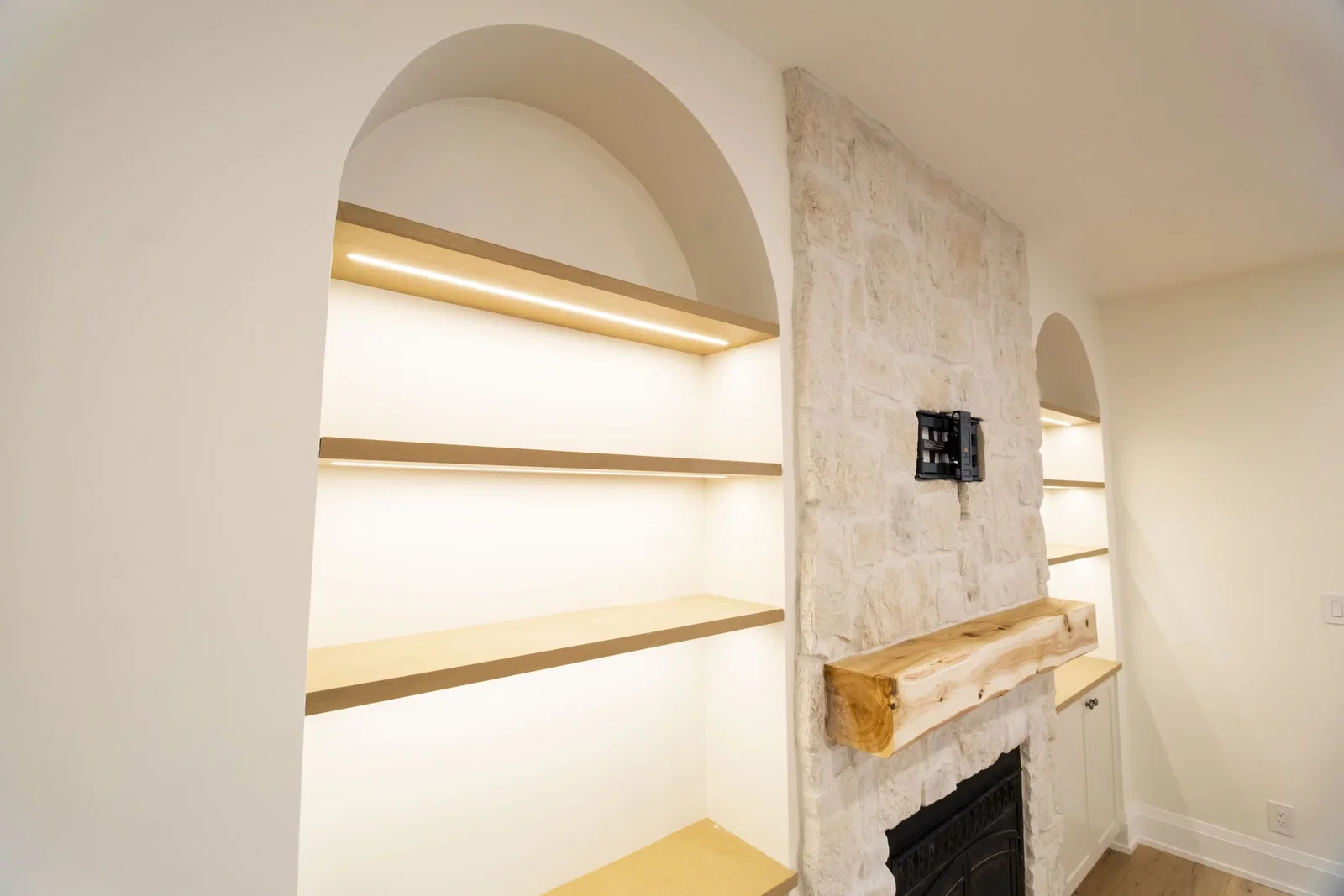 Arched built-in shelving