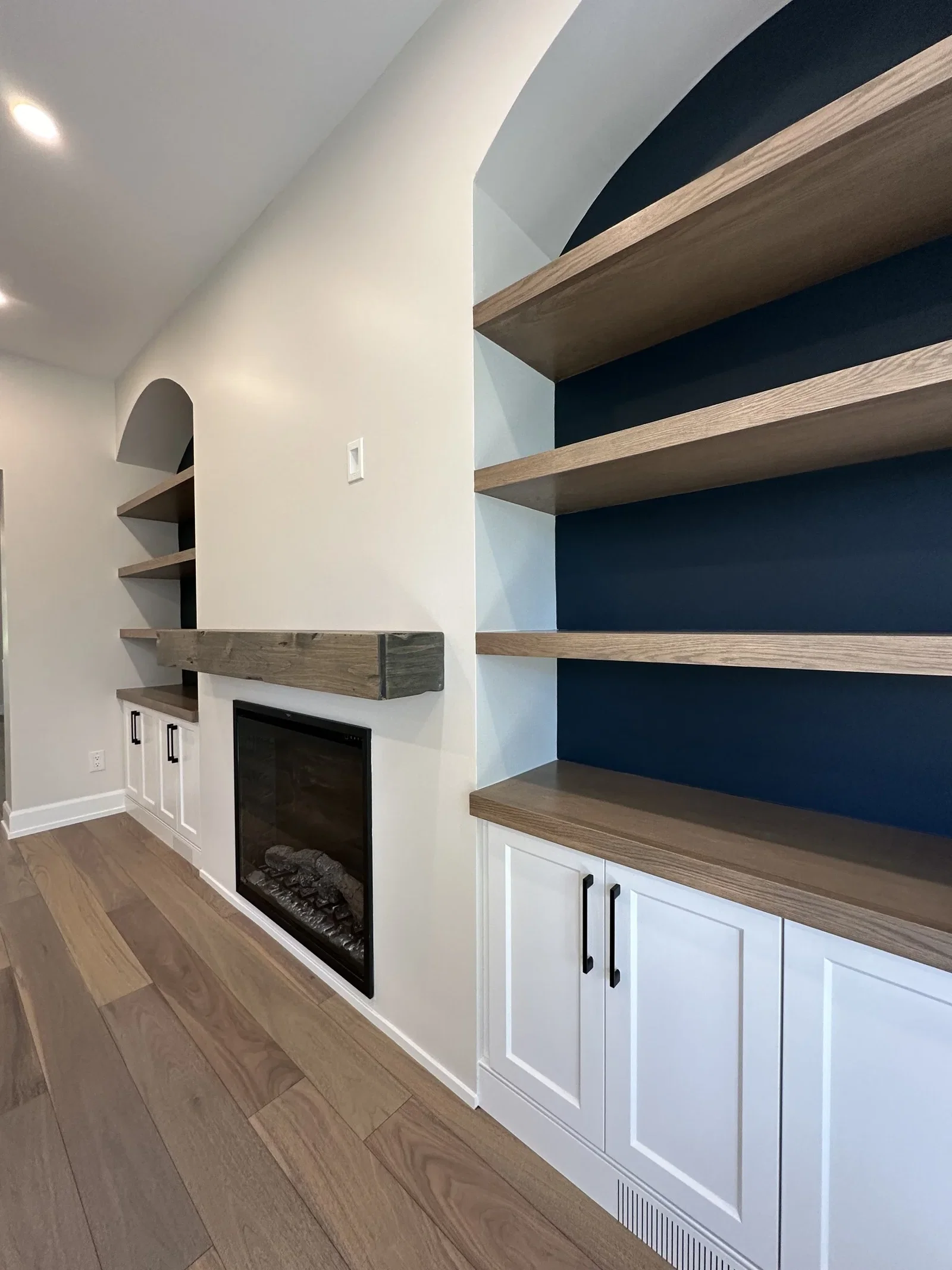 Arched built-in shelving