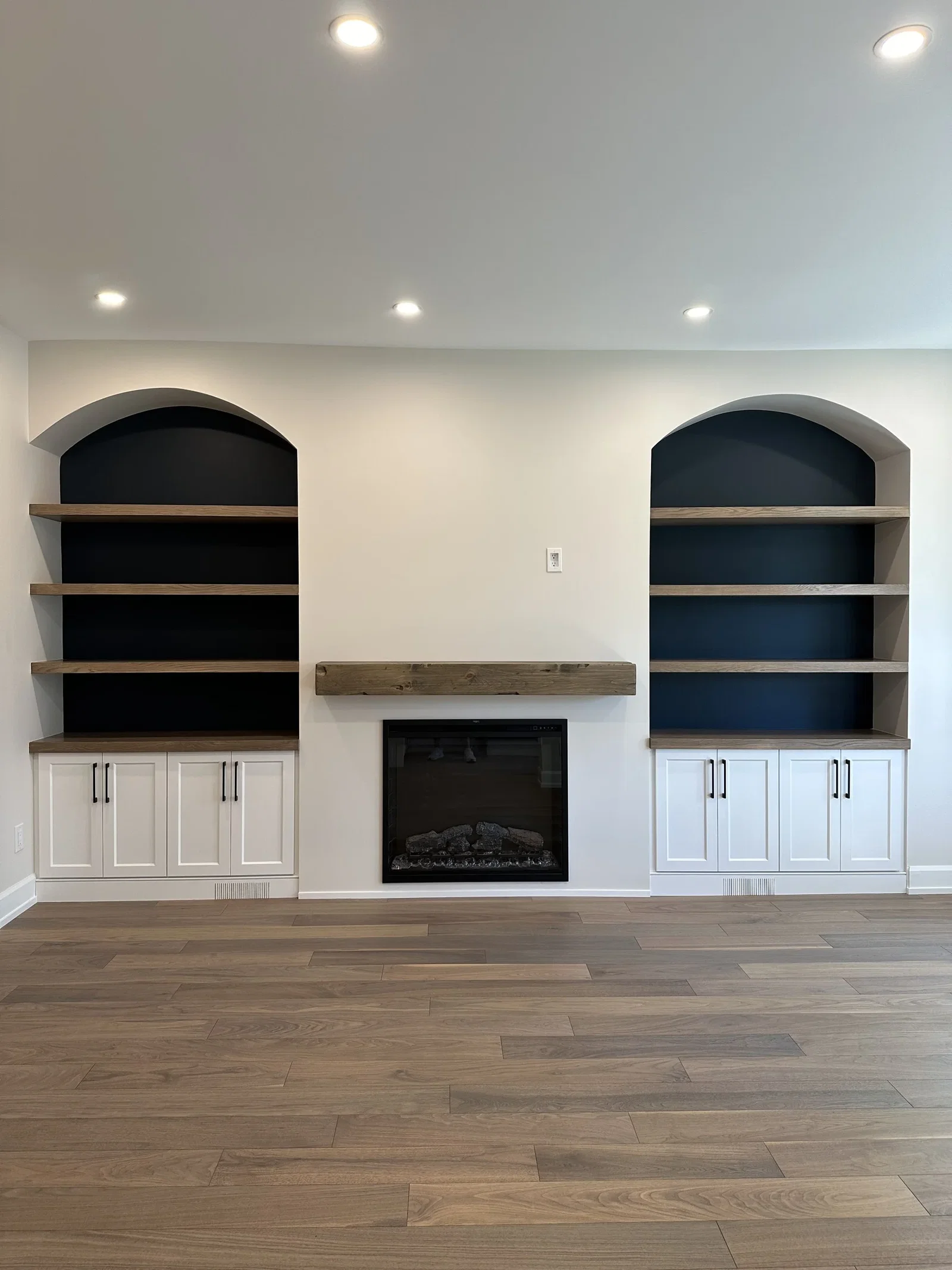 Built-in shelving and fireplace