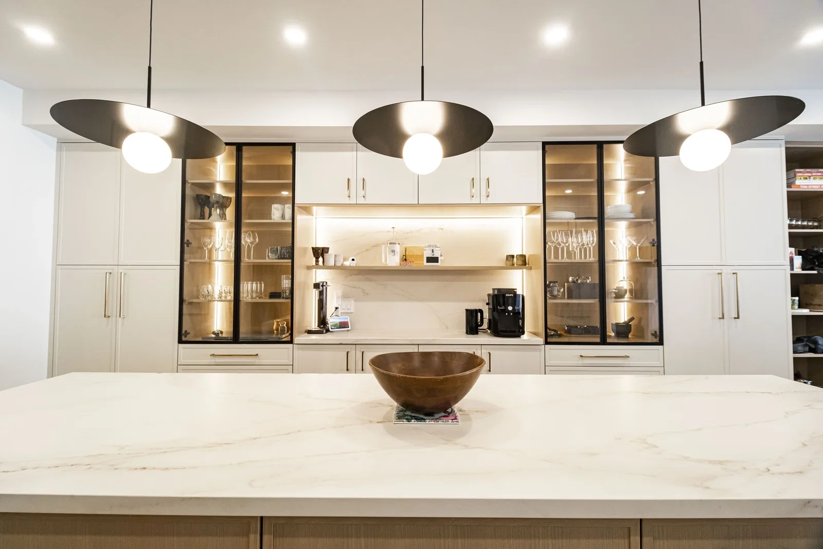 Kitchen island and glass cabinets