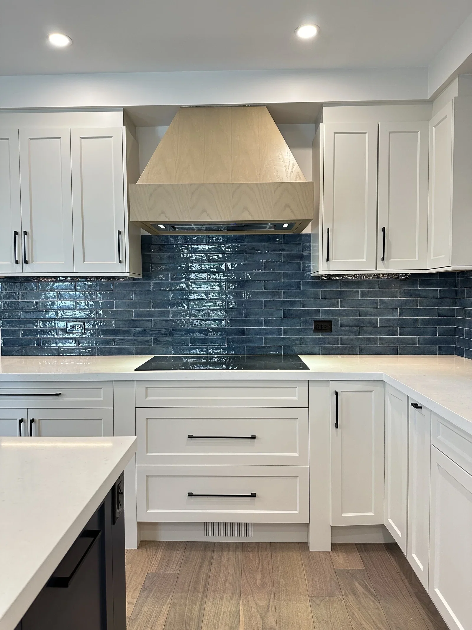 Kitchen range wall with tile backsplash