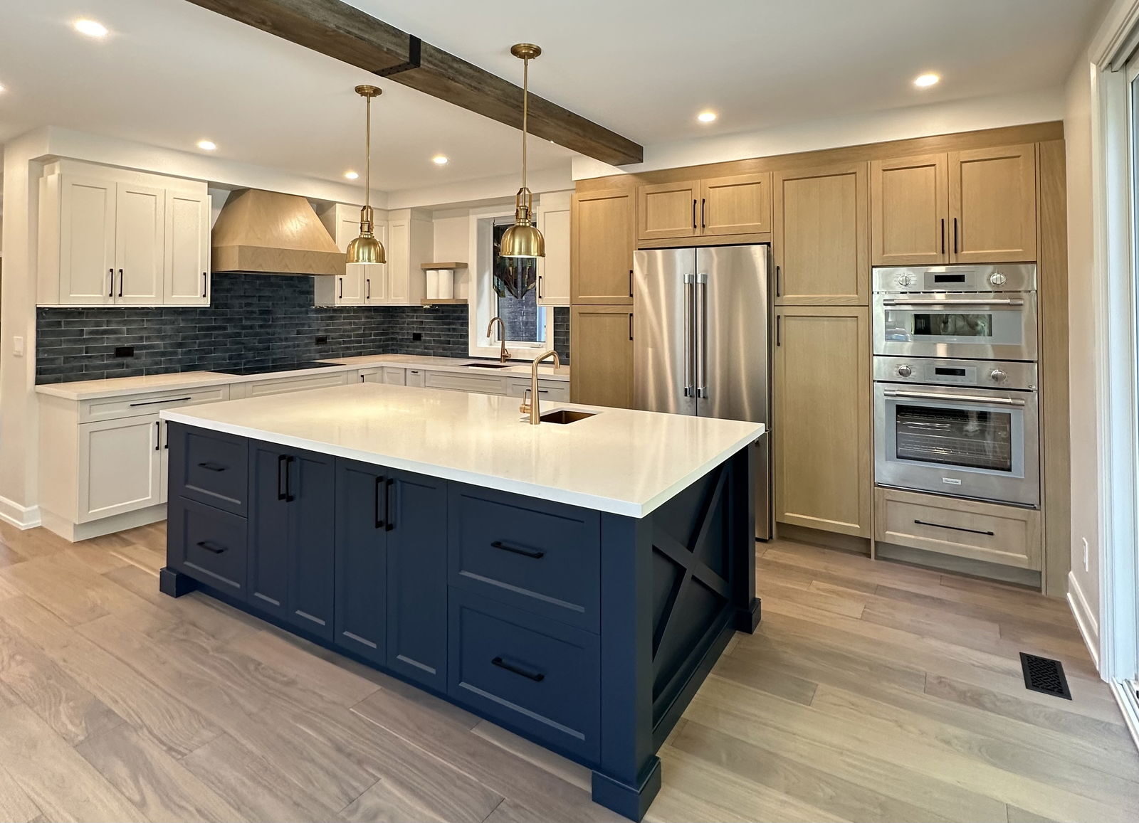 Farmhouse kitchen with two-toned cabinets