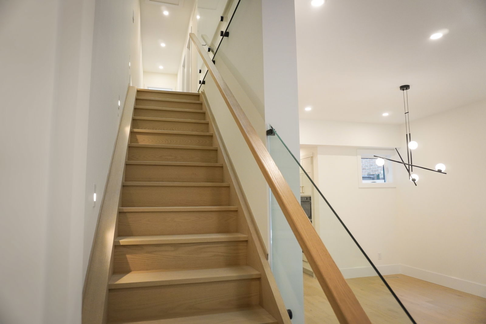 Modern staircase with glass railing