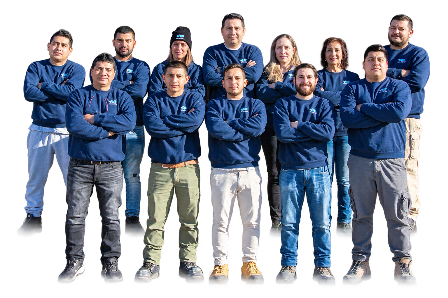 Professional construction team standing in front of a recently completed project.