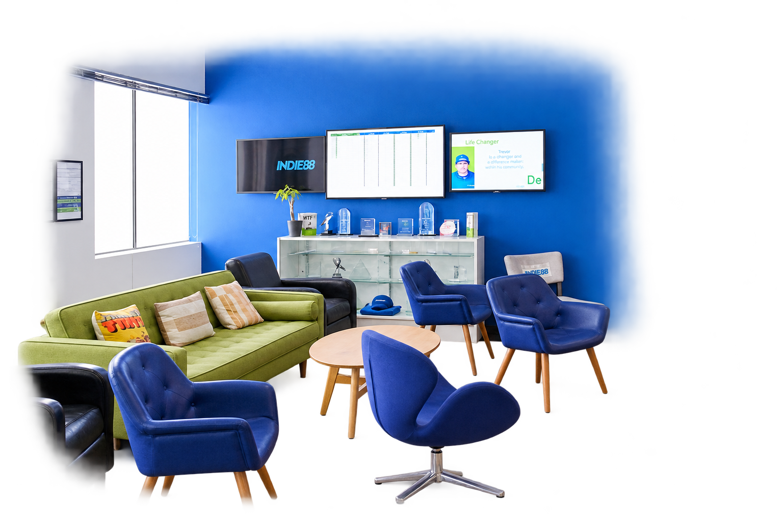 Office lounge seating area with blue accent walls